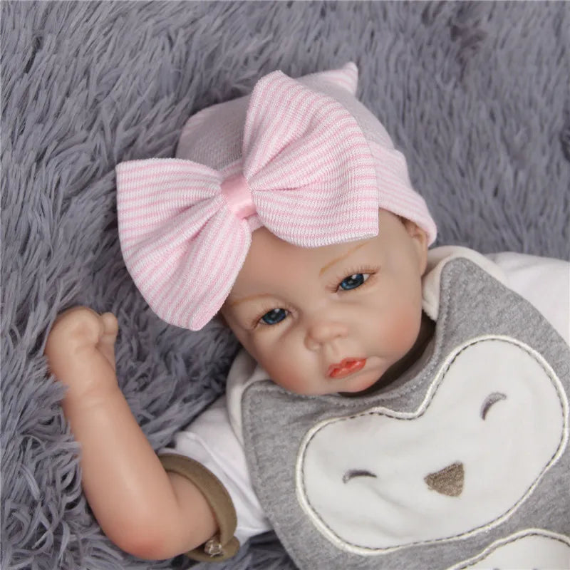 Bonnets bébé avec nœud